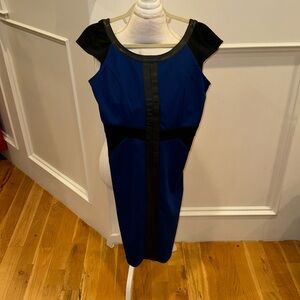 Black and blue color black dress with leather trim. Very flattering